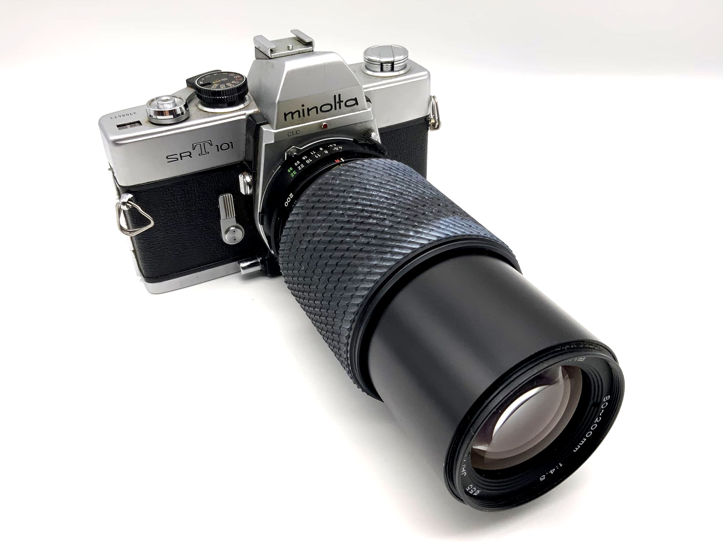 Minolta SRT101 mit Tokina 4.5 80-200mm Objektiv Spiegelreflexkamera 35mm analog