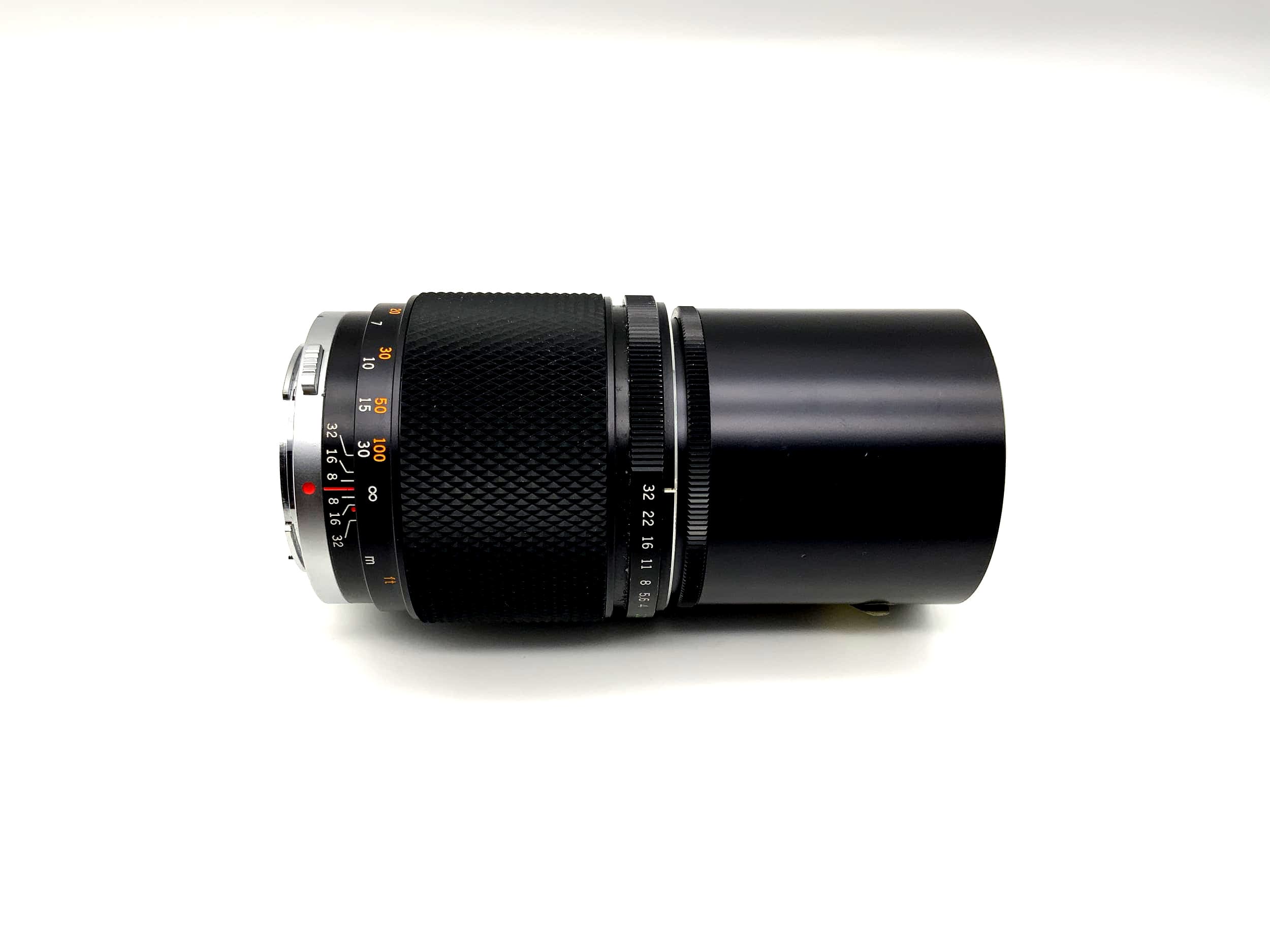 Olympus OM-System Zuiko MC Auto-T 200 mm 1:4 Objektiv analog