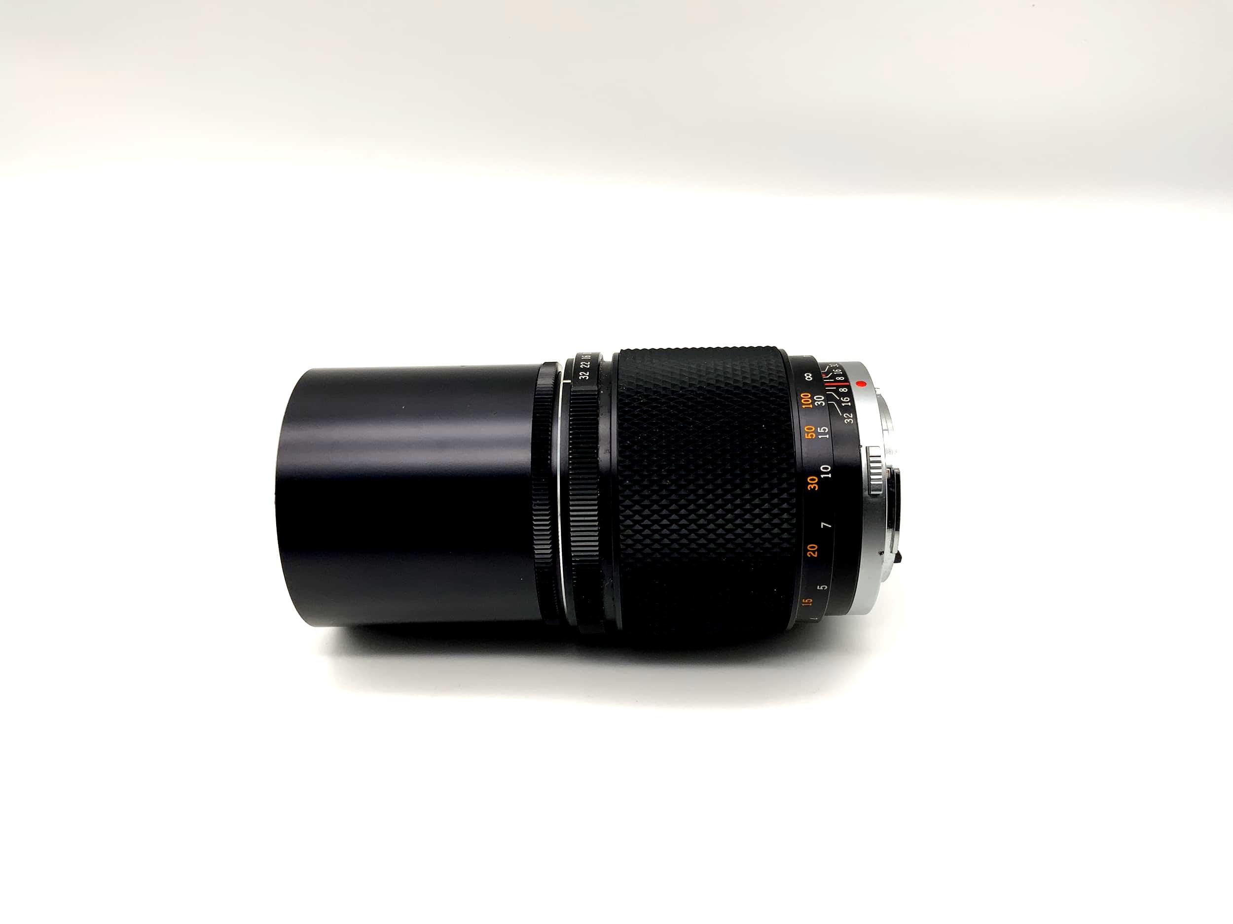 Olympus OM-System Zuiko MC Auto-T 200 mm 1:4 Objektiv analog