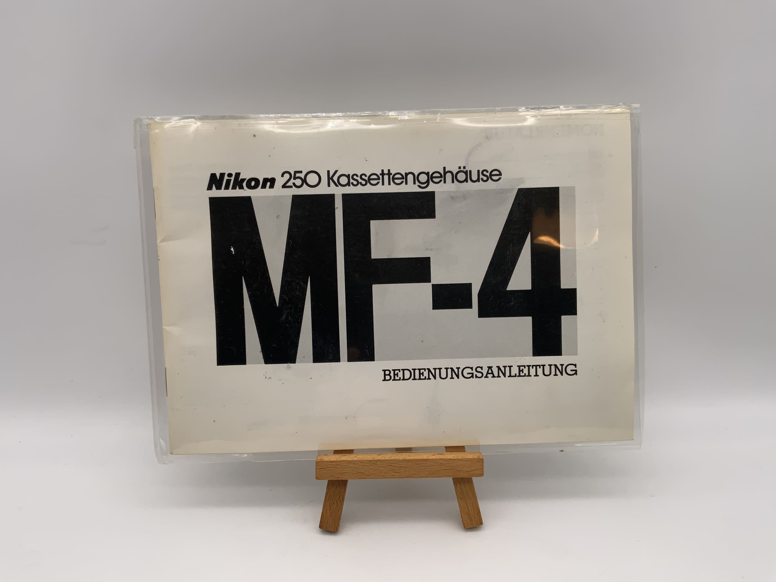 Nikon MF-4 250 Kassettengehäuse Bedienungsanleitung Deutsch