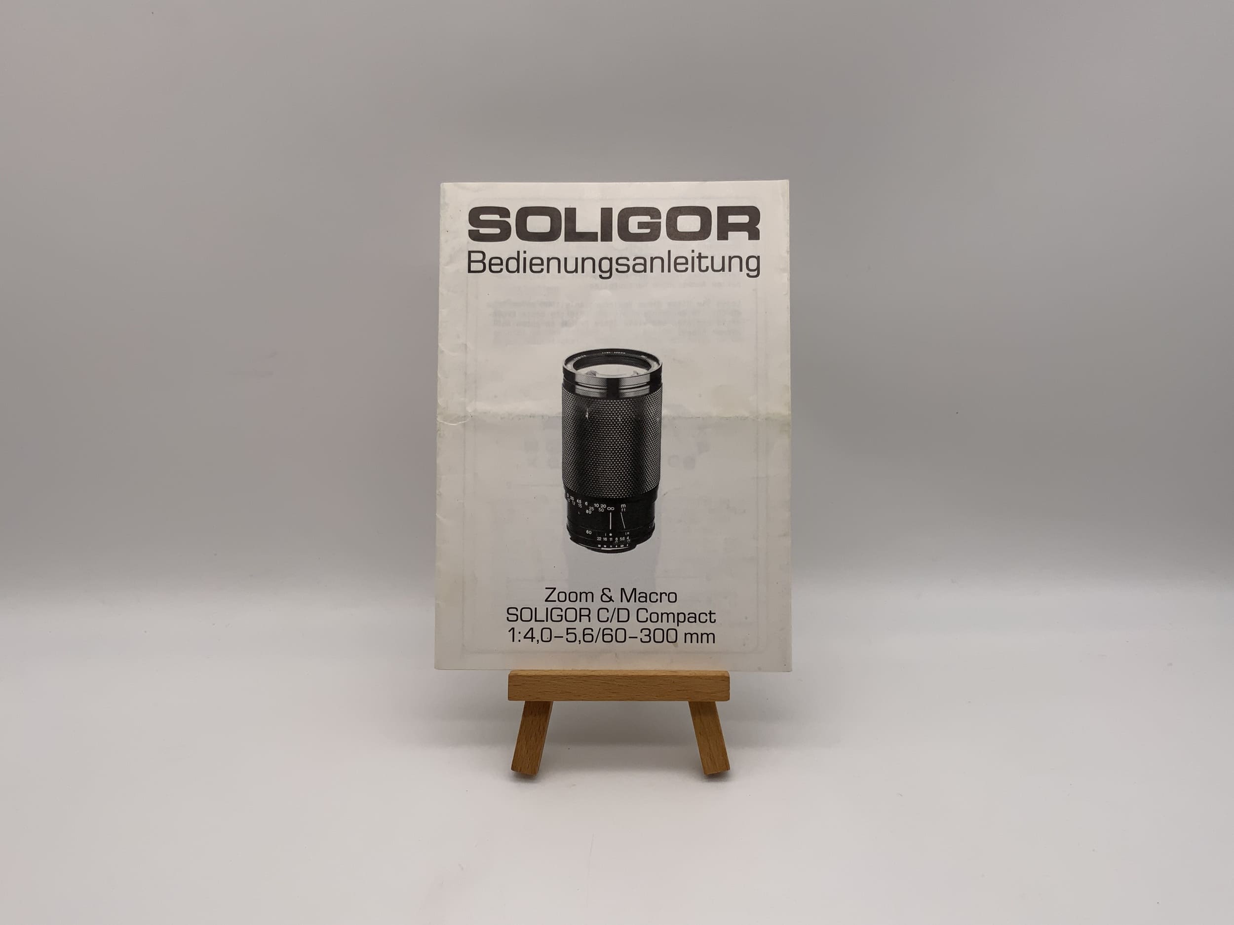 Soligor C/D Compact Zoom & Macro 1:4,0-5,6/60-300mm Bedienungsanleitung Deutsch