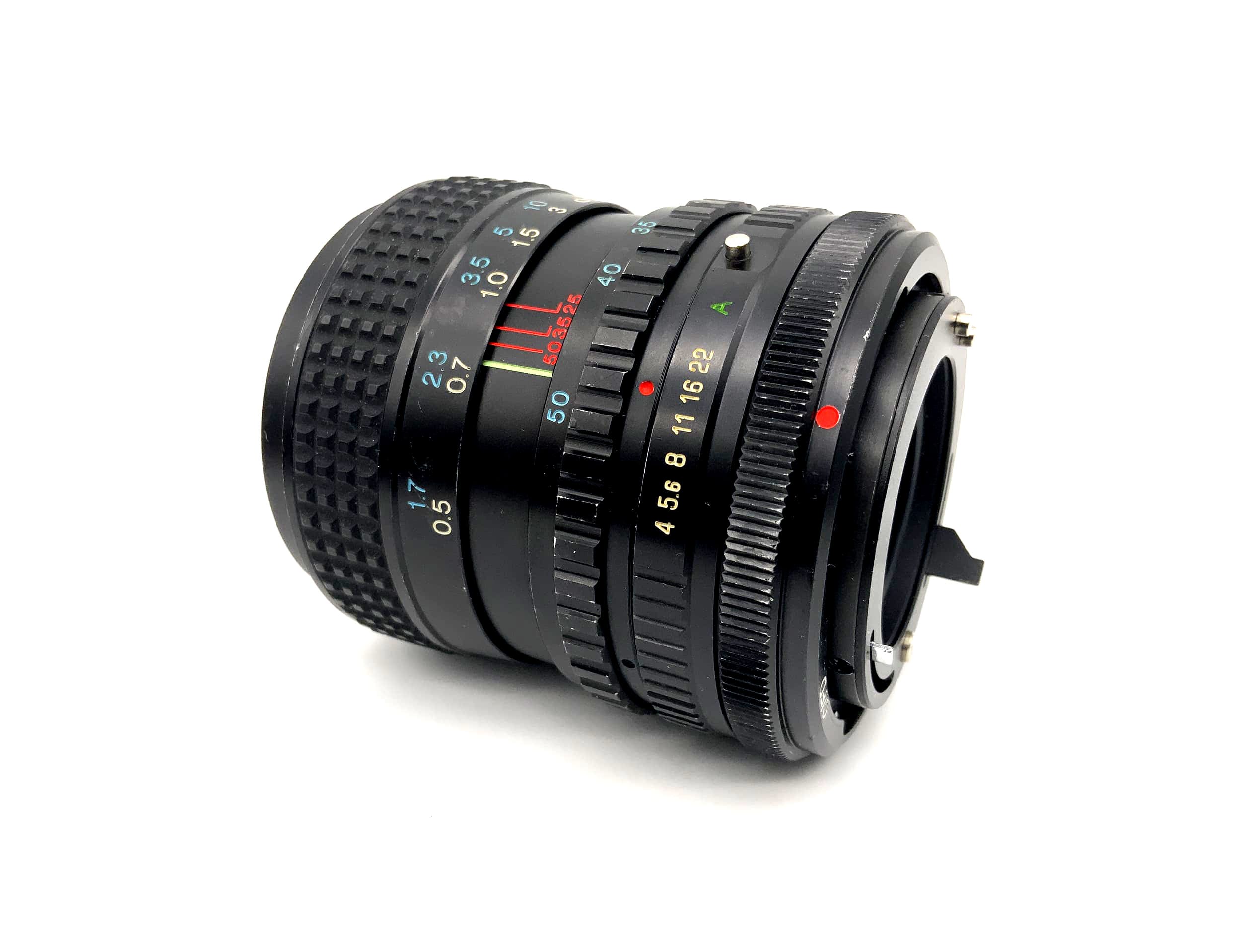 Tokina 25-50mm 1:4 Objektiv RMC Kamera Lens (Canon FD) Nebel!