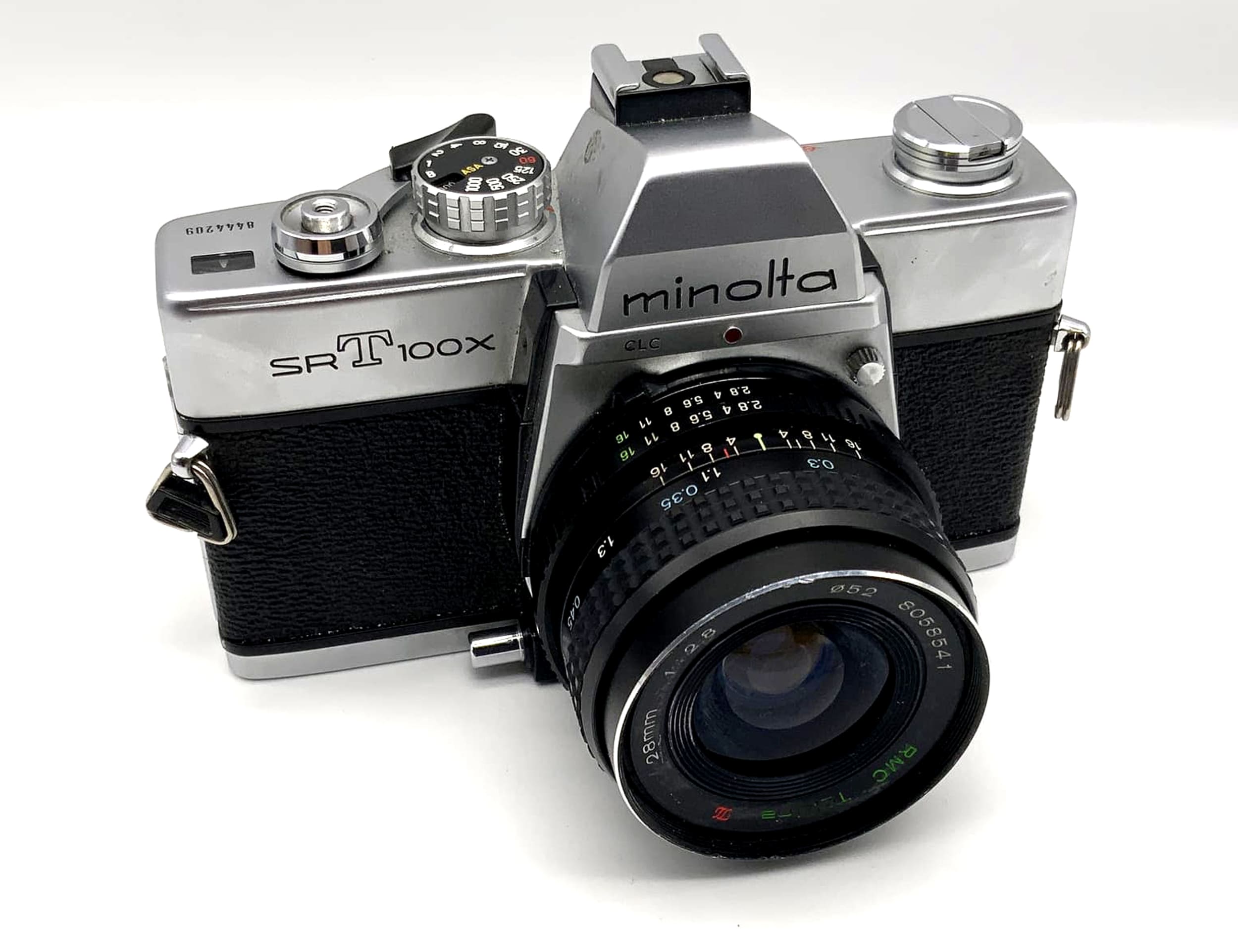 Minolta SRT 100x mit Tokina RMC 2.8 28mm Spiegelreflexkamera 35mm analog