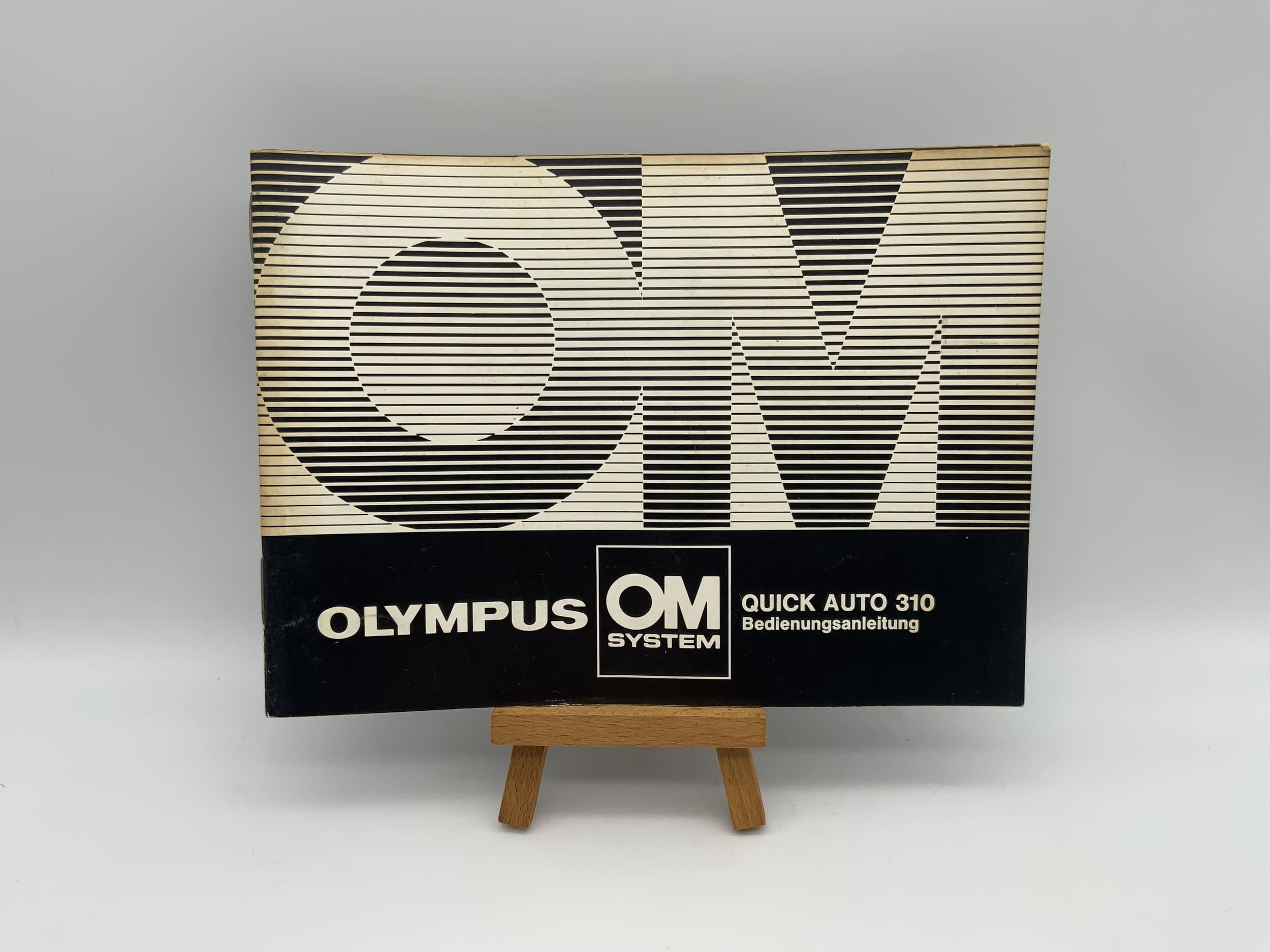 Olympus Quick Auto 310 Bedienungsanleitung Deutsch