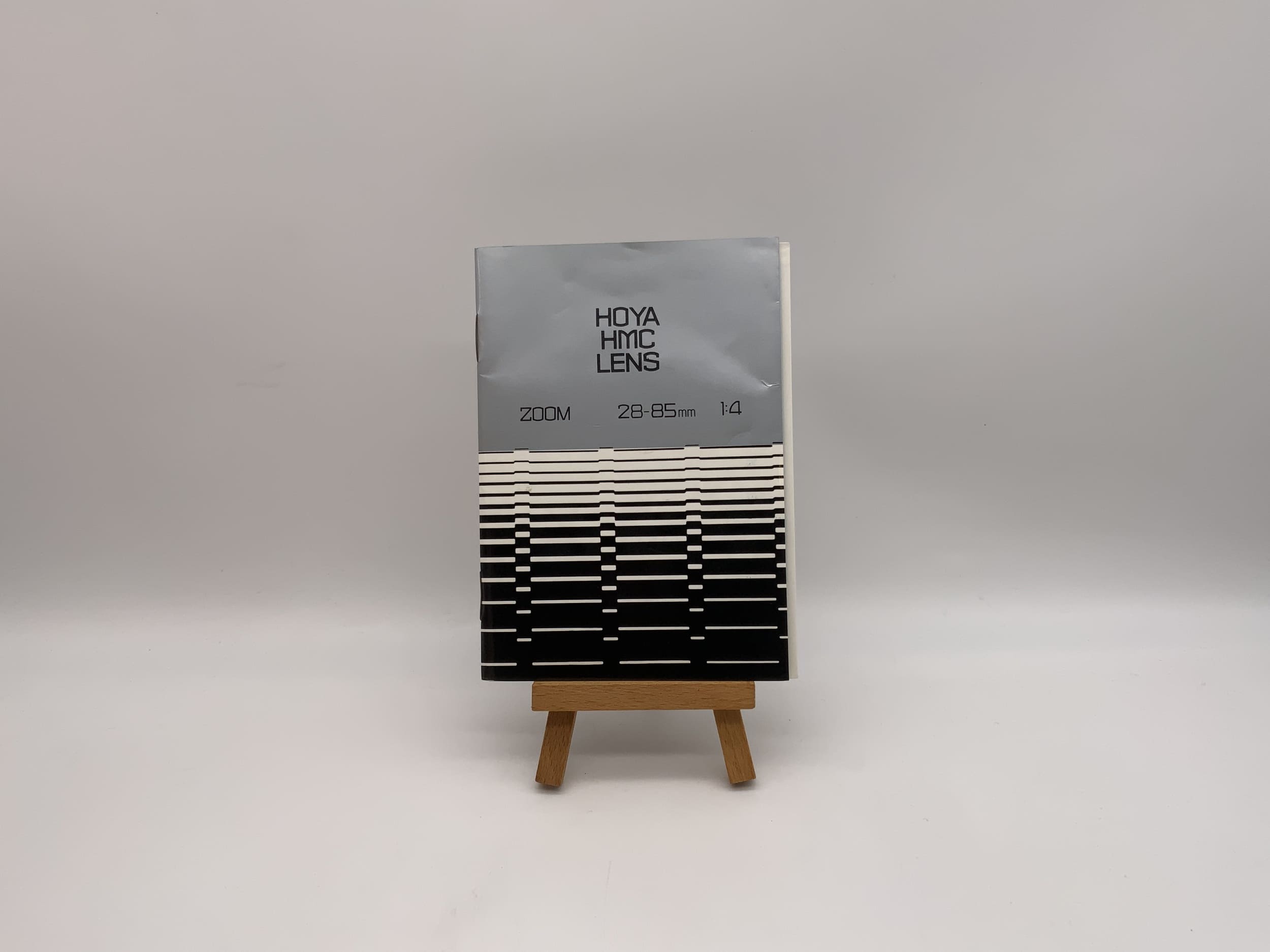 Hoya HMC Lens Zoom 28-85mm 1:4 Bedienungsanleitung Deutsch