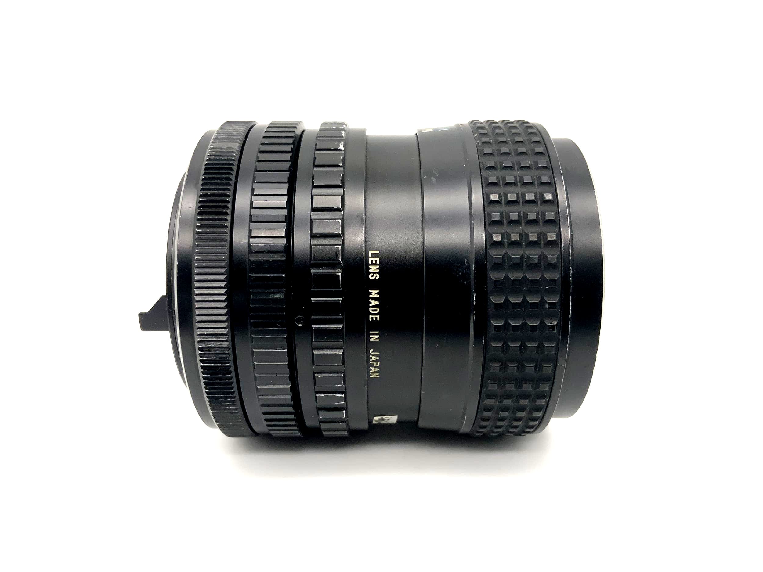 Tokina 25-50mm 1:4 Objektiv RMC Kamera Lens (Canon FD) Nebel!